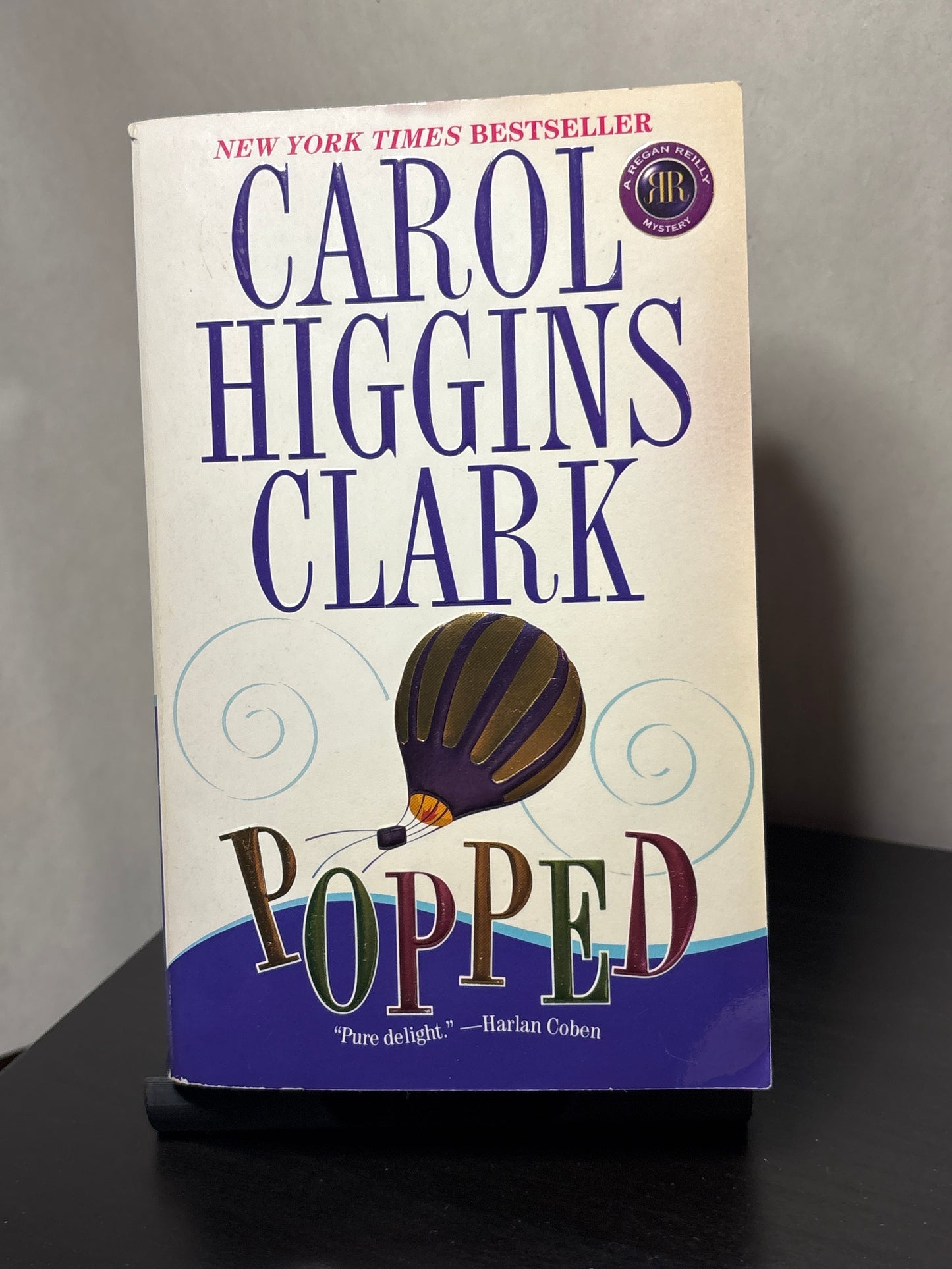 Popped by Carol Higgins Clark (Regan Reilly Mysteries #7)