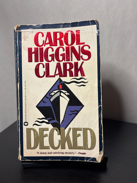 Decked by Carol Higgins Clark (Regan Reilly Mysteries #1) | Classic Cozy Mystery