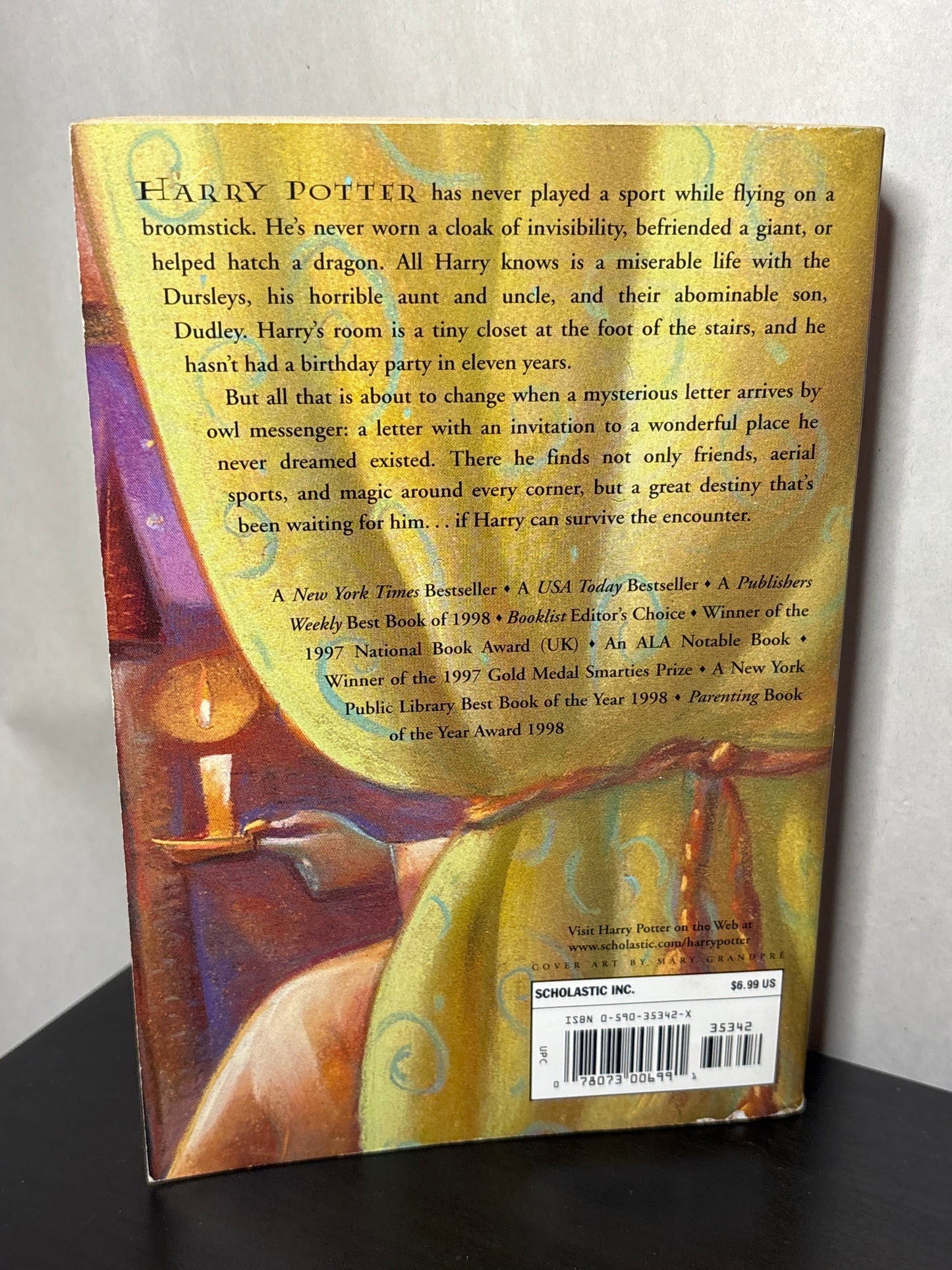 Harry Potter and the Sorcerer's Stone by J.K. Rowling ( Harry Potter #1)